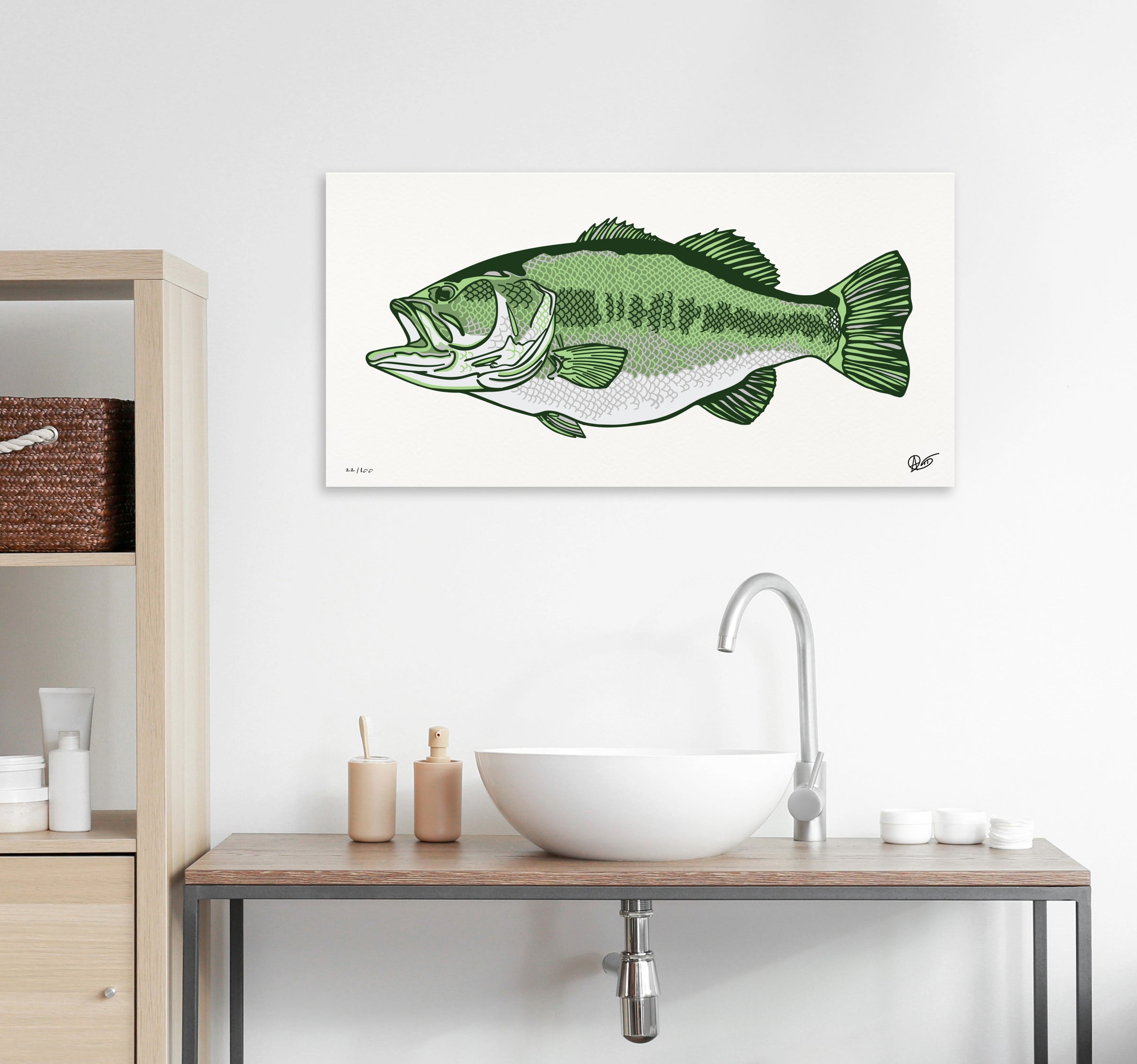 Largemouth bass canvas print on a wall above a bathroom sink with toiletries.