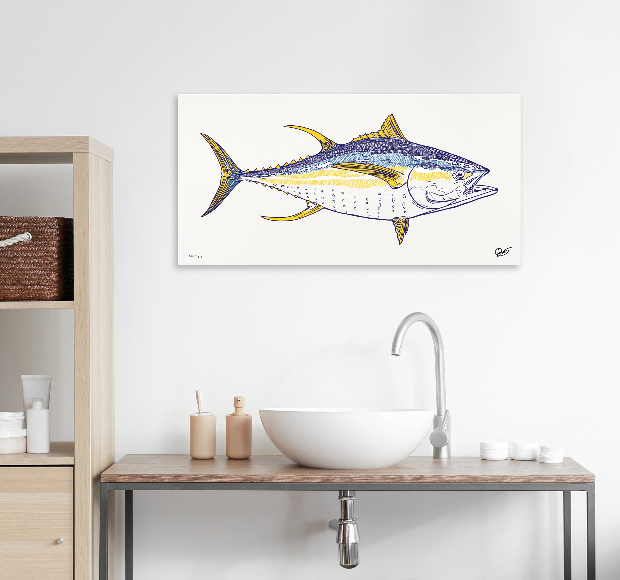 Canvas print of a yellowfin on a wall above a kitchen sink.