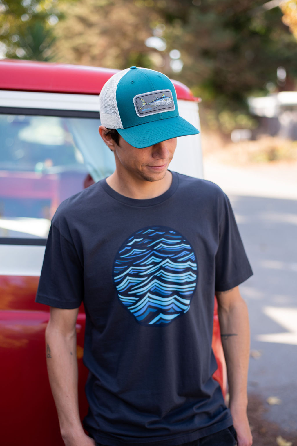 Model wearing the Short Period Short Sleeve T-Shirt in Graphite Black