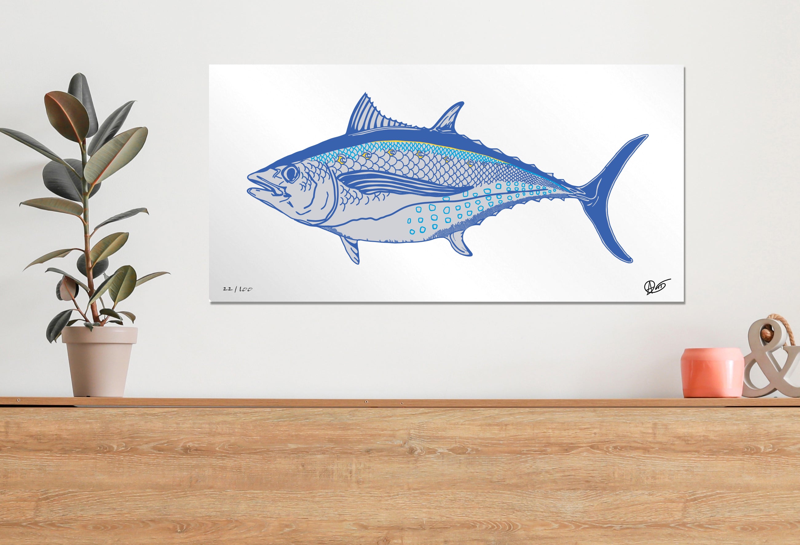 Limited edition albacore metal print above a dresser